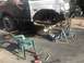 1989 Ford Bronco - A Ford F-250 truck is shown with its front suspension disassembled, indicating ongoing repair work.