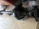 1989 Ford Bronco - Ford Dana 60 rear axle assembly shown on jack stands in a garage.