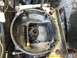 1970 Volkswagen Beetle - Close-up view of a vehicle's clutch housing and input shaft assembly, with surrounding mechanical components.