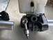 1993 Mazda MX-3 - Close-up of a brake master cylinder assembly, likely removed for engine or transaxle work.