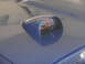 1967 Pontiac GTO - A close-up of the hood-mounted tachometer on a blue 1967 Pontiac GTO.
