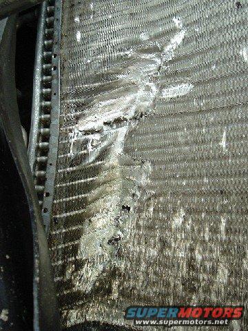 a/c condensor.  Apparently, when my roommate went through the fence, a board came up from underneath and did this.