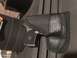 1993 Ford Bronco - A handgun is secured in a holster, with part of a cylindrical object visible.