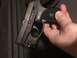 1993 Ford Bronco - Ruger LCP pistol with serial number 373-02189 is held by a hand.