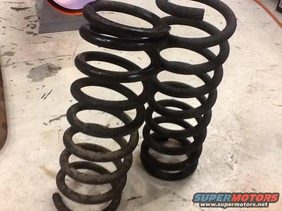 0929714ab9e046b18565f6d0d0d7a86e.jpeg Springs as they came out of the citric acid bath. They were painted black from the factory. 