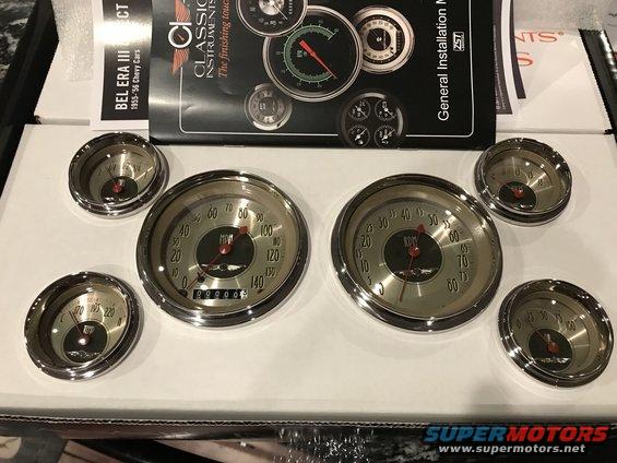 Set of Classic Instruments gauges including a speedometer and tachometer, with an installation manual