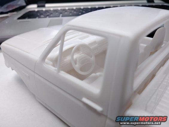 20190308_134040_hdr.jpg Another discrepency found. The provided steering wheel is not from a 1994 model. It is from a '93 model year. Beginning in 1994, Ford installed driver's side airbags in the F150s and Broncos which used a different steering wheel to accomodate the bag. I'm not sure if I'm going to create a new steering wheel or pass this truck off as a 1993 :)
