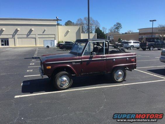 Maroon 1979 Ford Bronco parked in a lot