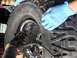 1970 Volkswagen Beetle - Working on a Mickey Thompson tire valve stem with a tool.