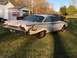 1960 Ford Starliner - This classic Ford coupe shows extensive damage to its rear quarter panel and trunk area.