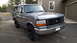 1995 Ford Bronco - This 1995 Ford Bronco is parked in front of a house and garage.