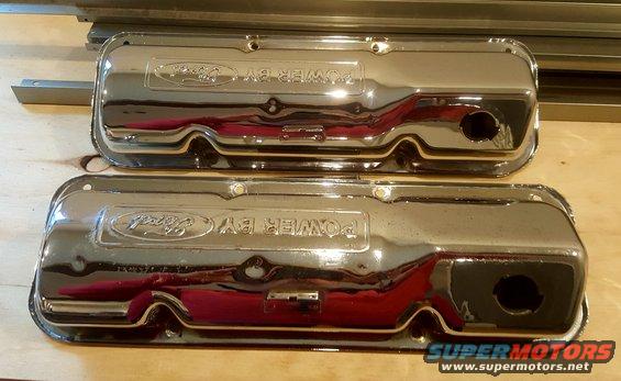 Two chrome valve covers with 'Ford' and 'POWER BY' embossed