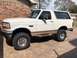 1995 Ford Bronco - This lifted 1992 Ford Bronco is parked on a brick driveway in front of a brick house.