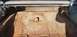 1962 Ford Galaxie - The interior of a car trunk shows significant rust and wear.