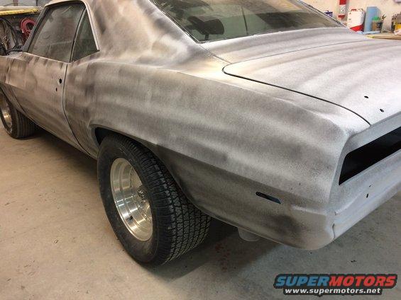 1969 Chevrolet Camaro in primer, rear quarter view. Ready for paint
