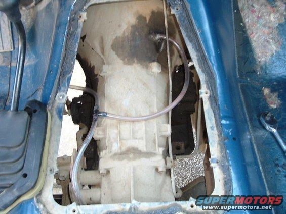 dscf0107.jpg re-routed the breather lines so that the diffs are on 1 line and the tranny and t-case are on another. 