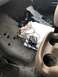 1995 Ford Bronco - A messy interior view shows a tangle of wires and a Virginia license plate on the floor of a vehicle.