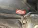 1995 Ford Bronco - A Jasper Engines & Transmissions sticker is affixed to the underside of a vehicle's component.