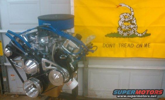 Engine with chrome accents and blue spark plug wires