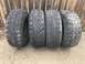1984 Ford Bronco - Set of four off-road tires for sale, ready for adventure.