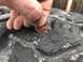1984 Ford Bronco - A penny is used to measure the tread depth of a worn tire.