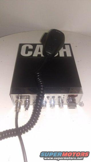 CB radio with microphone attached, "CASH" text on top