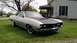 1971 Ford Torino - This 1971 Ford Torino features a two-tone paint scheme with a black hood and custom wheels.