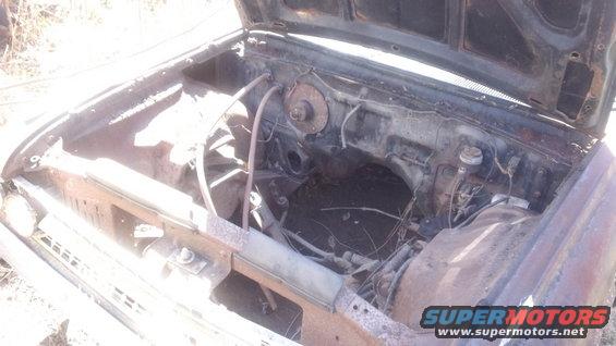 1961 Ford Starliner engine bay, rusty and empty