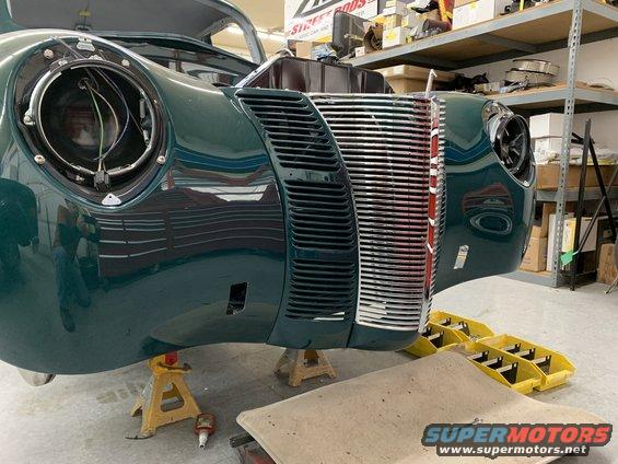 1940 Ford Coupe front end, grille and headlight removed, on jack stands