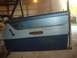 1962 Ford Galaxie - Close-up of a vintage car's interior door panel, a two-tone blue design and chrome accents.