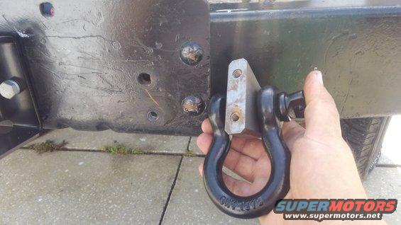 kimg0584.jpg i picked up these shackle mounts on ebay. figuered it would give the bumper some more beefy looks and add functionality. the shackles are 3/4" D-rings from harbor freight 

i removed one of the 3 bolts per side holding the sides of the bumper on and then drilled the lower hole. i have the mounts slightly angled to help prevent them from swaying back and forth as much when driving. also slightly better if used with some side load 