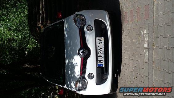 Rear view of white Renault Twingo with license plate WU-2615A