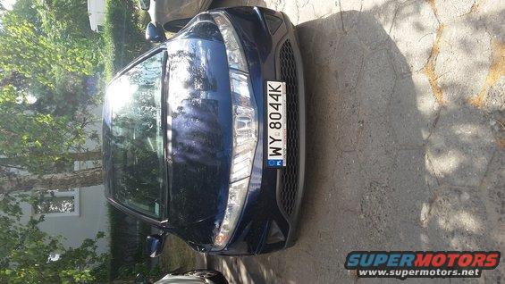 Blue sedan front view with license plate WY 8044K