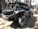 1970 Volkswagen Beetle - This custom dune buggy features a prominent roll cage and a spare tire mounted at the rear.