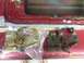 1994 Ford Bronco - Comparison of a new and old tailgate latch mechanism for a vehicle.
