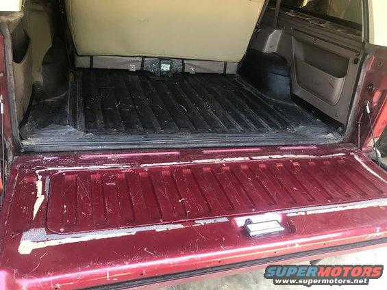Red 1994 Ford Bronco interior cargo area and tailgate