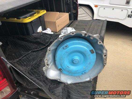 Automatic transmission torque converter and housing, blue converter inside silver housing