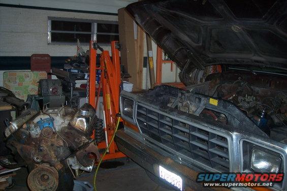 1978 Ford Bronco front with hood open and engine nearby
