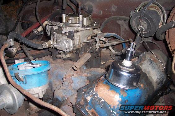 Engine bay with carburetor and distributor