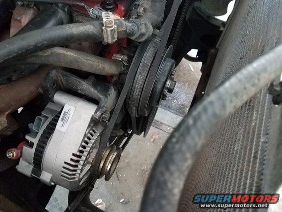 Alternator and serpentine belt system on an engine