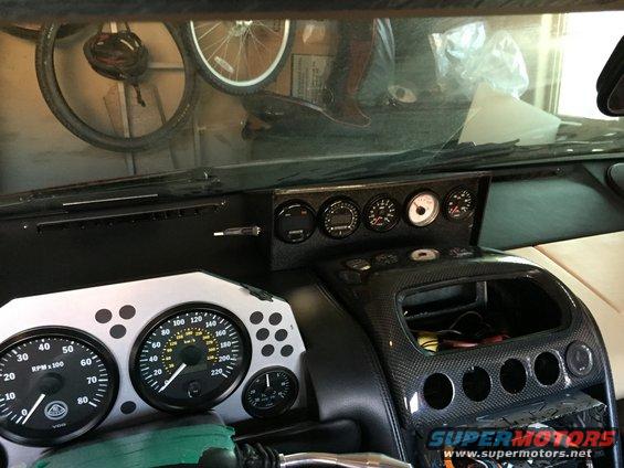 Interior dashboard with Lotus gauges and carbon fiber trim. 2000 Lotus Esprit