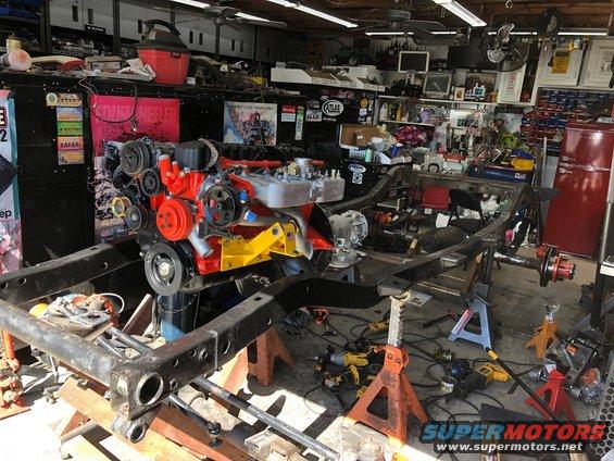 1992 Jeep Wrangler frame on jack stands with engine installed