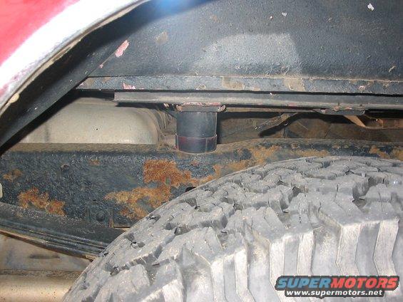 106_0671.jpg Rear passenger side Body Lift Rubber Donut and Bracket