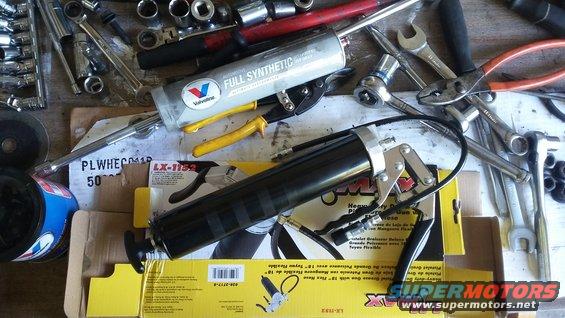 Grease gun with Valvoline full synthetic grease and various tools