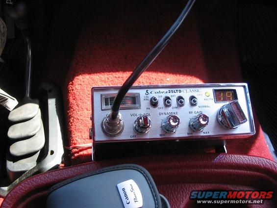 106_0698.jpg close up of the CB in it's upright position on the front of the console/cup holder box.