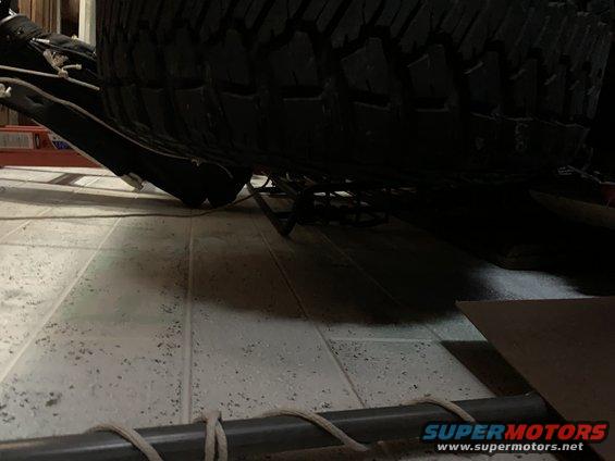 Spare tire and undercarriage of a 1996 Ford Bronco