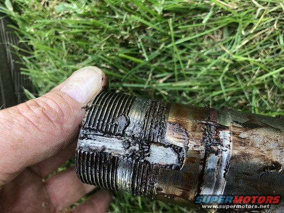 strippedbroncospindle.jpg Used the wrong lock ring set to hold the bearings in place.