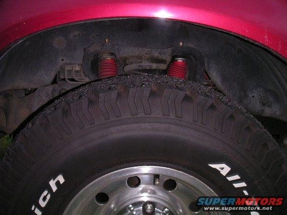 tire-and-wheel.jpg The all-terrains, with the ranchos in the background.