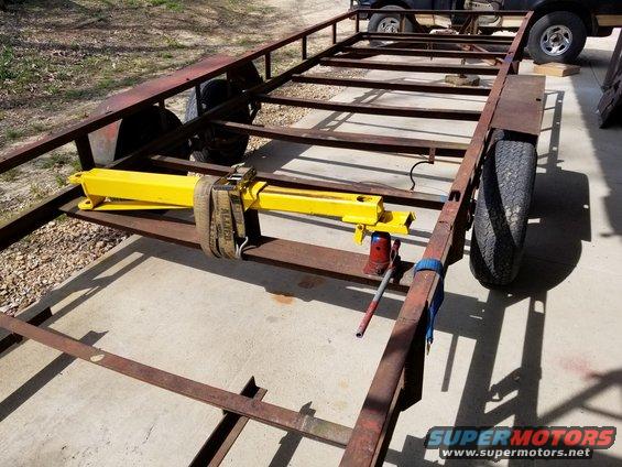 trailer20d.jpg To straighten them, I used a 2-post lift arm, a heavy commercial ratchet strap, and a bottle jack.