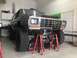 1979 Ford Bronco - Front view of a 1978 Ford Bronco undergoing maintenance in a garage.
